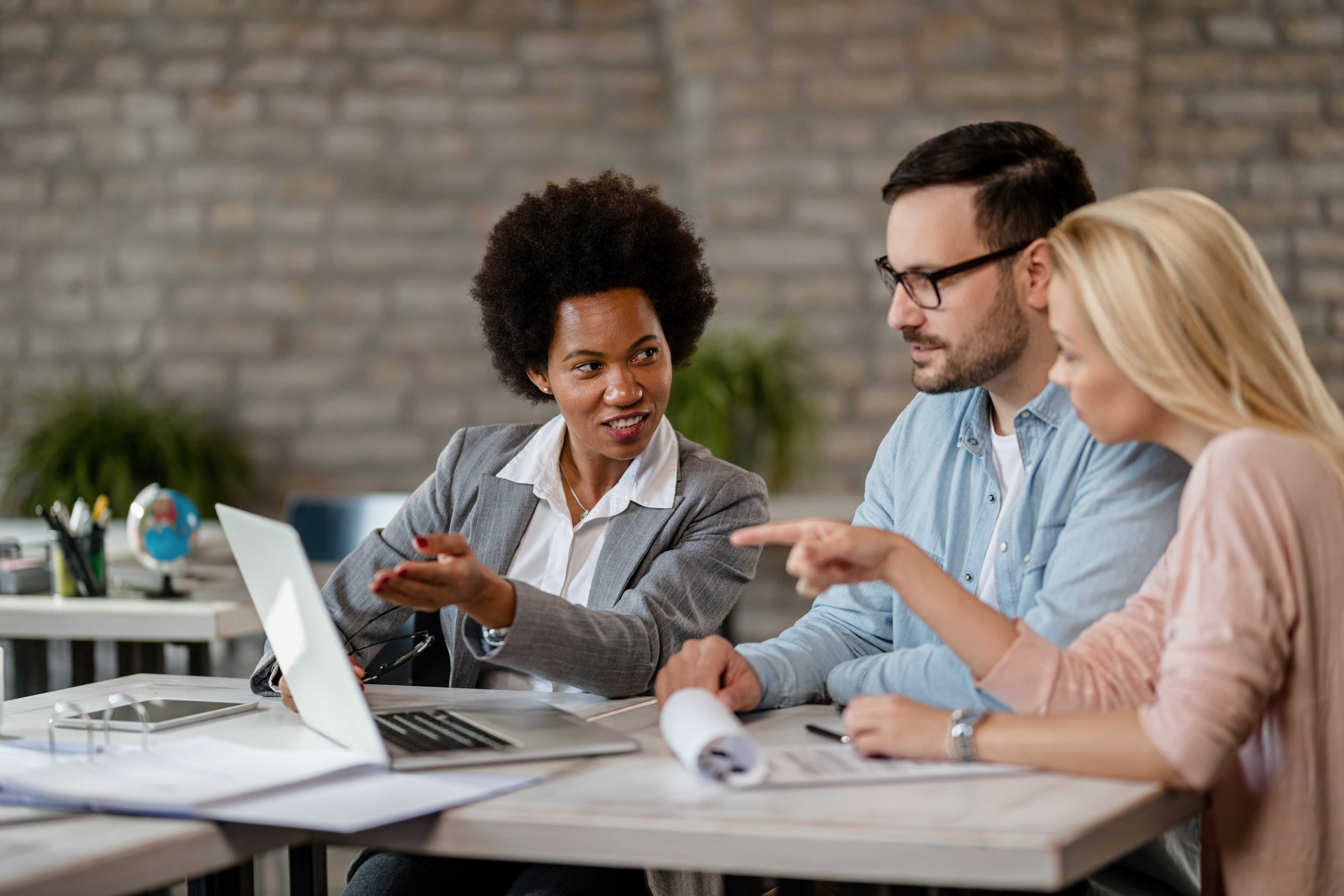 black-female-insurance-agent-using-computer-with-couple-consultations-office (1) black-female-insurance-agent-using-computer-with-couple-consultations-office (1)